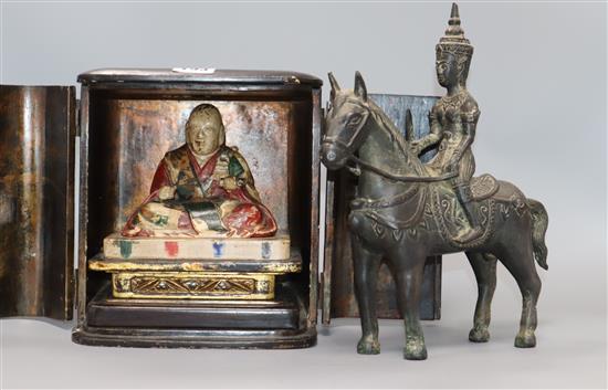 A Japanese Buddhist lacquer wood portable shrine (zushi), edo period and a Thai bronze deity on a horse